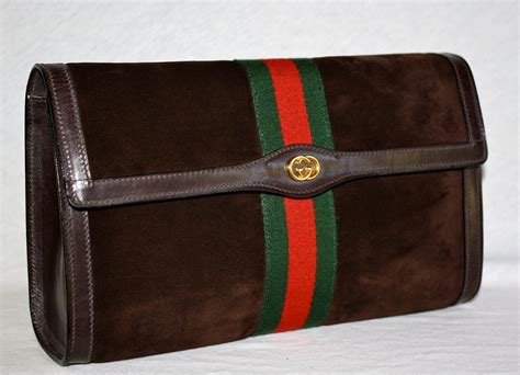 clutch gucci uomo|gucci vintage suede clutch.